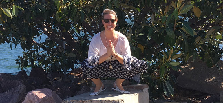 Guest blogger Melissa doing a yoga pose outside