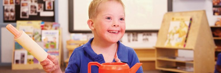 Boy with Down syndrome in an Early Childhood's disability service