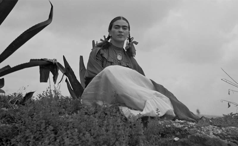 Frida Kahlo sitting outside