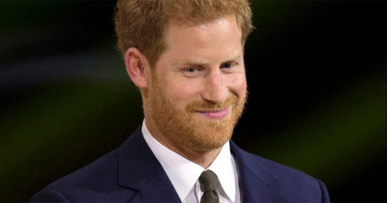 Prince Harry wearing a suit at an event